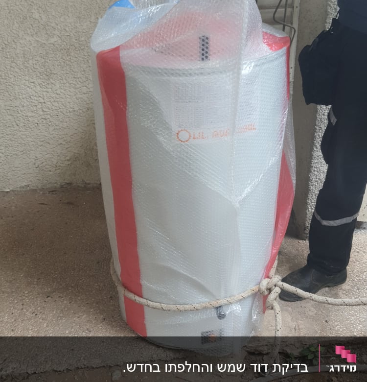 דוד שמש עטוף בניילון בועות עם חבל